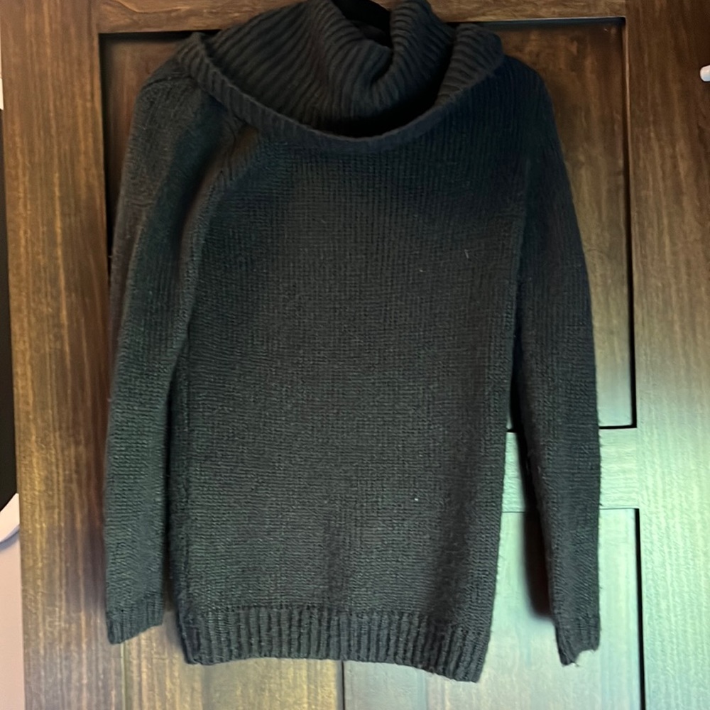 Turtle neck sweater.